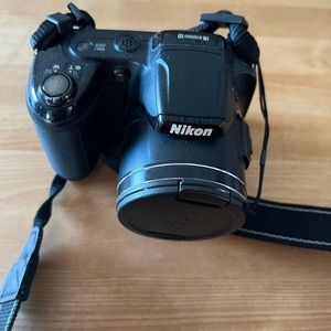 Nikon digital camera.  Takes regular double A batteries works great!